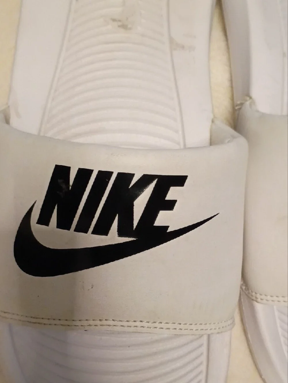 Nike White Slide Sandals with Black Logo Swoosh